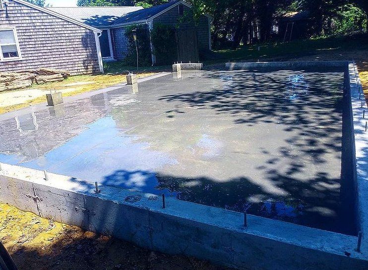 Freshly poured concrete slab on grade. The slab will be the base for a garage or large shed in Oshawa.