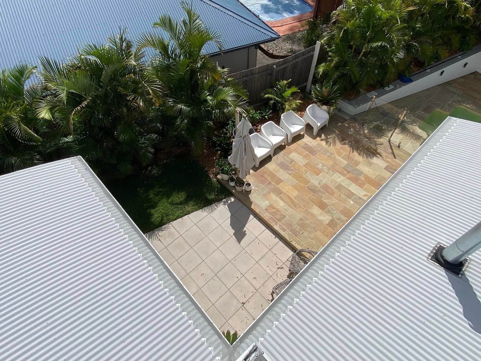 A Close Up Of A Gutter With A Mesh On It — The Guttering Cleaning Man in Forster, NSW