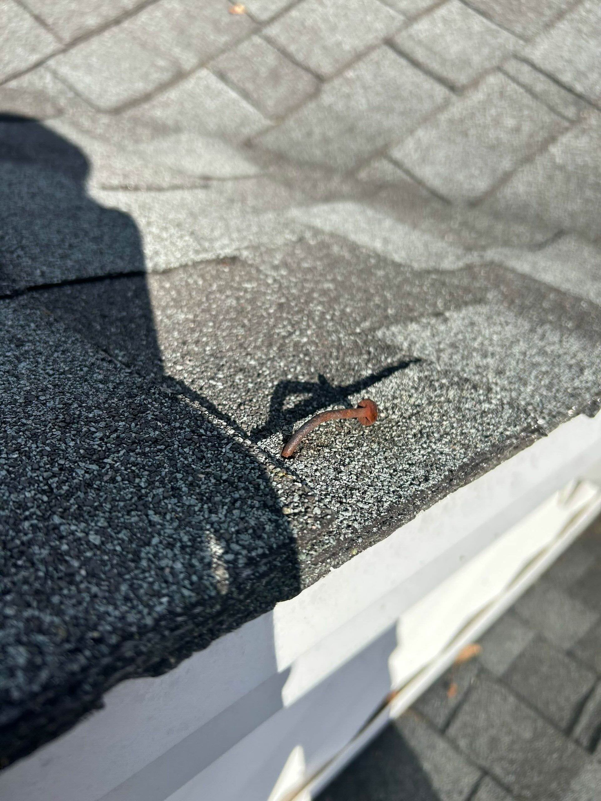 potential leak point from nail hole on Connecticut roof