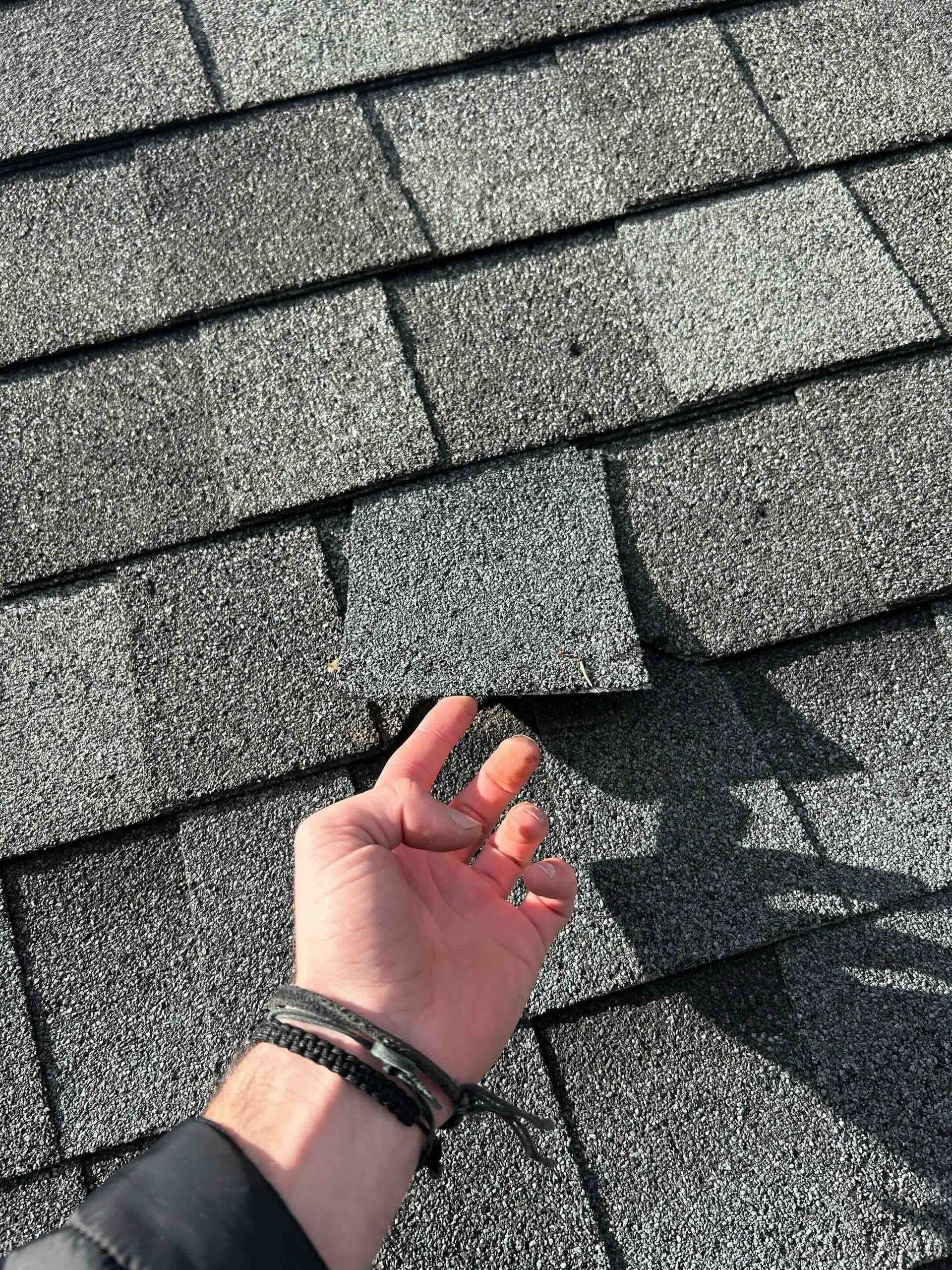 slipping asphalt shingle on residential roof in connecticut