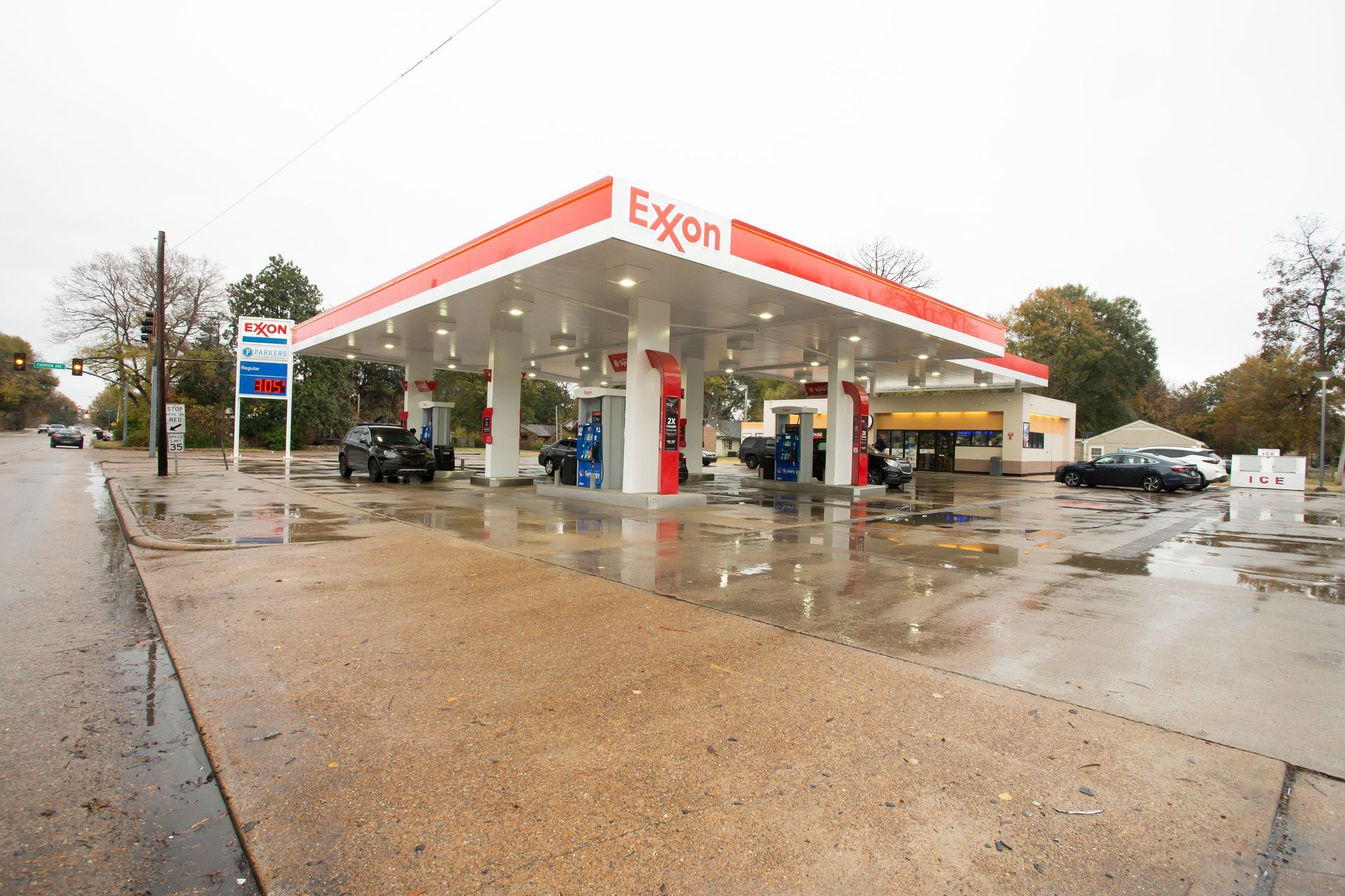 An exxon gas station on a rainy day