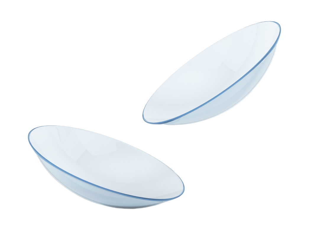 Dos lentes de contacto transparentes y delgadas que flotan sobre un fondo blanco liso.