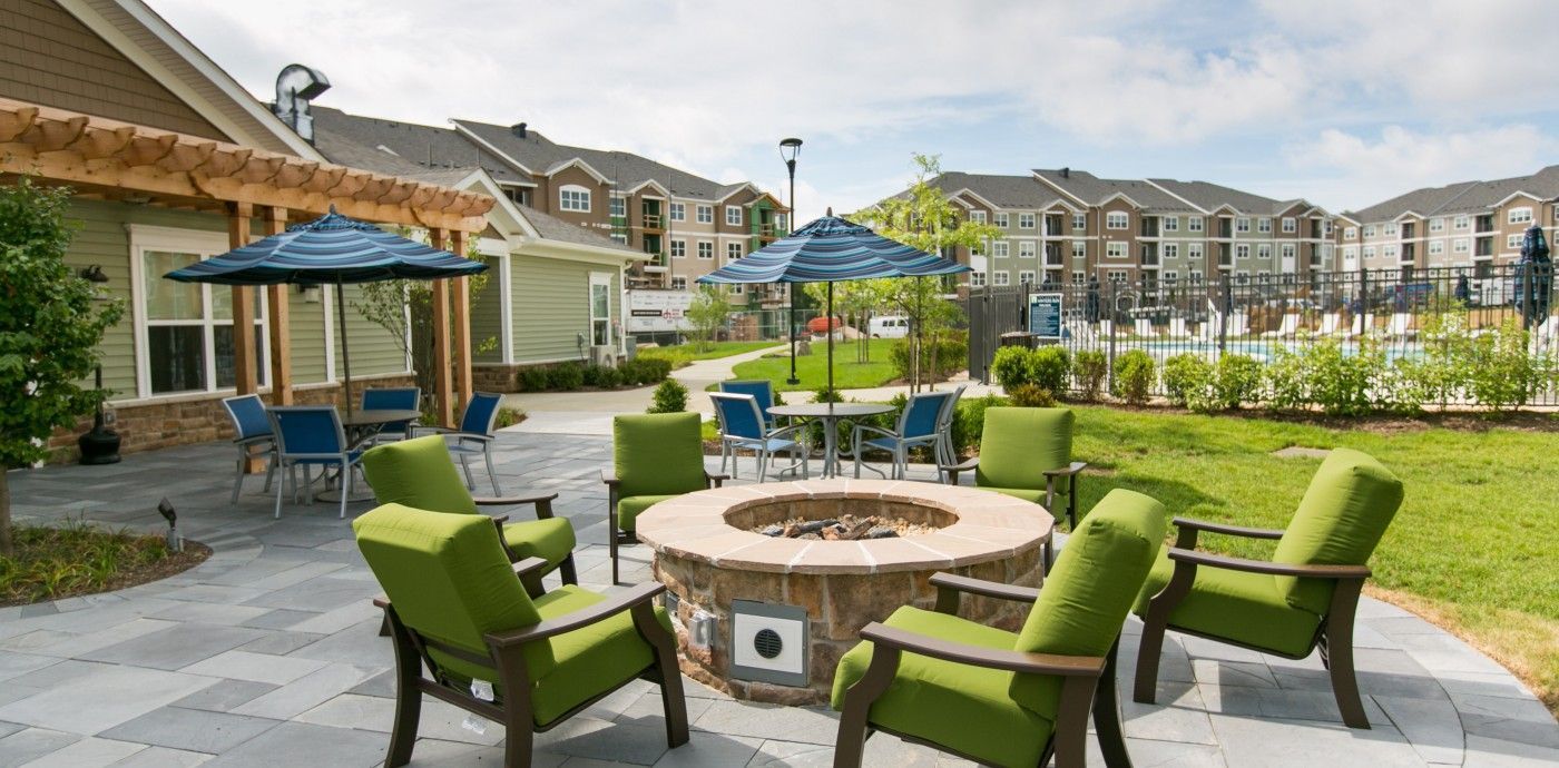 The Park at Winters Run outdoor fire pit with chairs.
