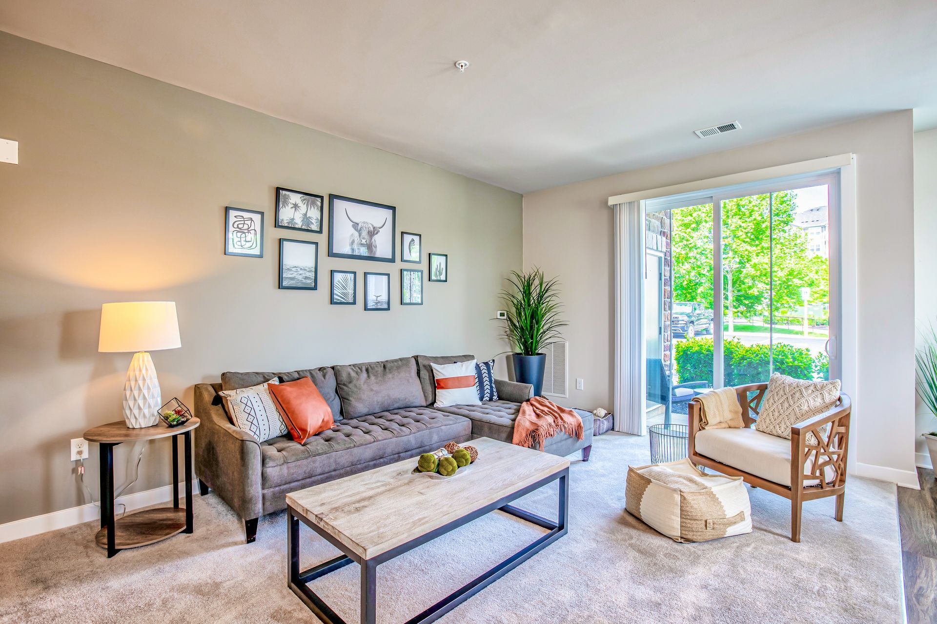 The Park At Winters Run apartment living room with balcony in Bel Air, MD.
