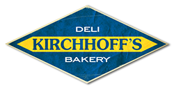 A blue and yellow sign for kirchhoff 's deli & bakery