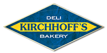 A blue and yellow sign for kirchhoff 's deli & bakery