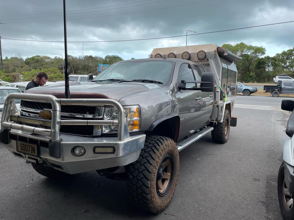 A Gray Truck is Parked in a Parking Lot on a Cloudy Day — Cairns Auto Electrical Mechanical Air & Audio in Mareeba, QLD