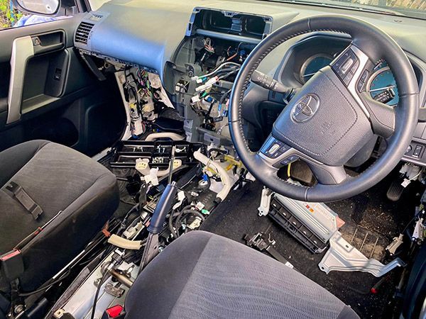 the Interior of a Toyota Car is Being Dismantled — Cairns Auto Electrical Mechanical Air & Audio in Mareeba, QLD
