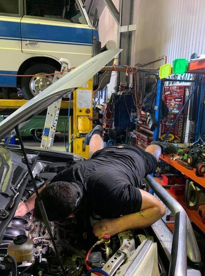 Mechanic Servicing A Car