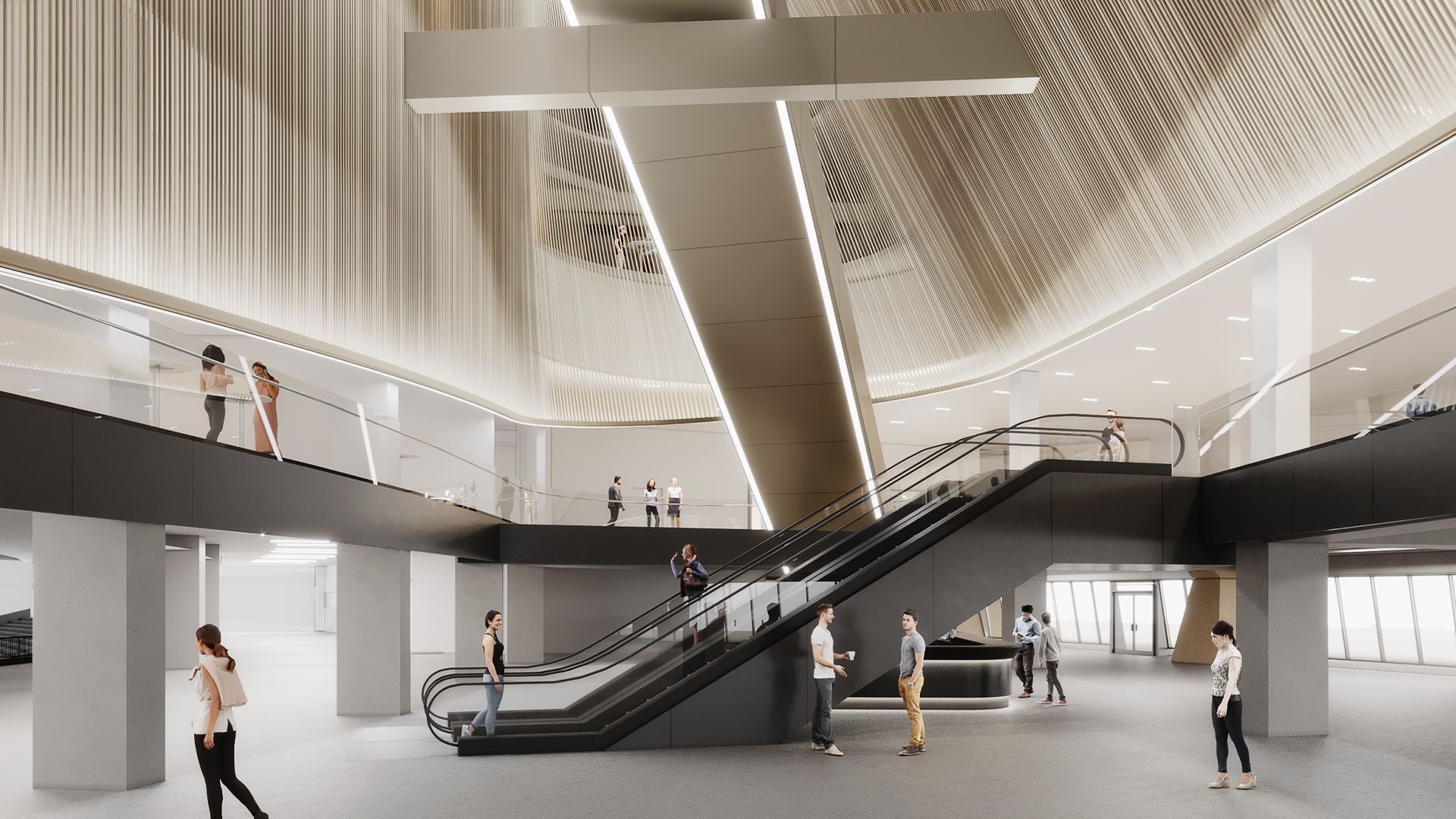 A group of people are walking down an escalator in a building.