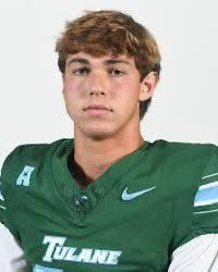 Tulane football player in green jersey, posed against a white background.