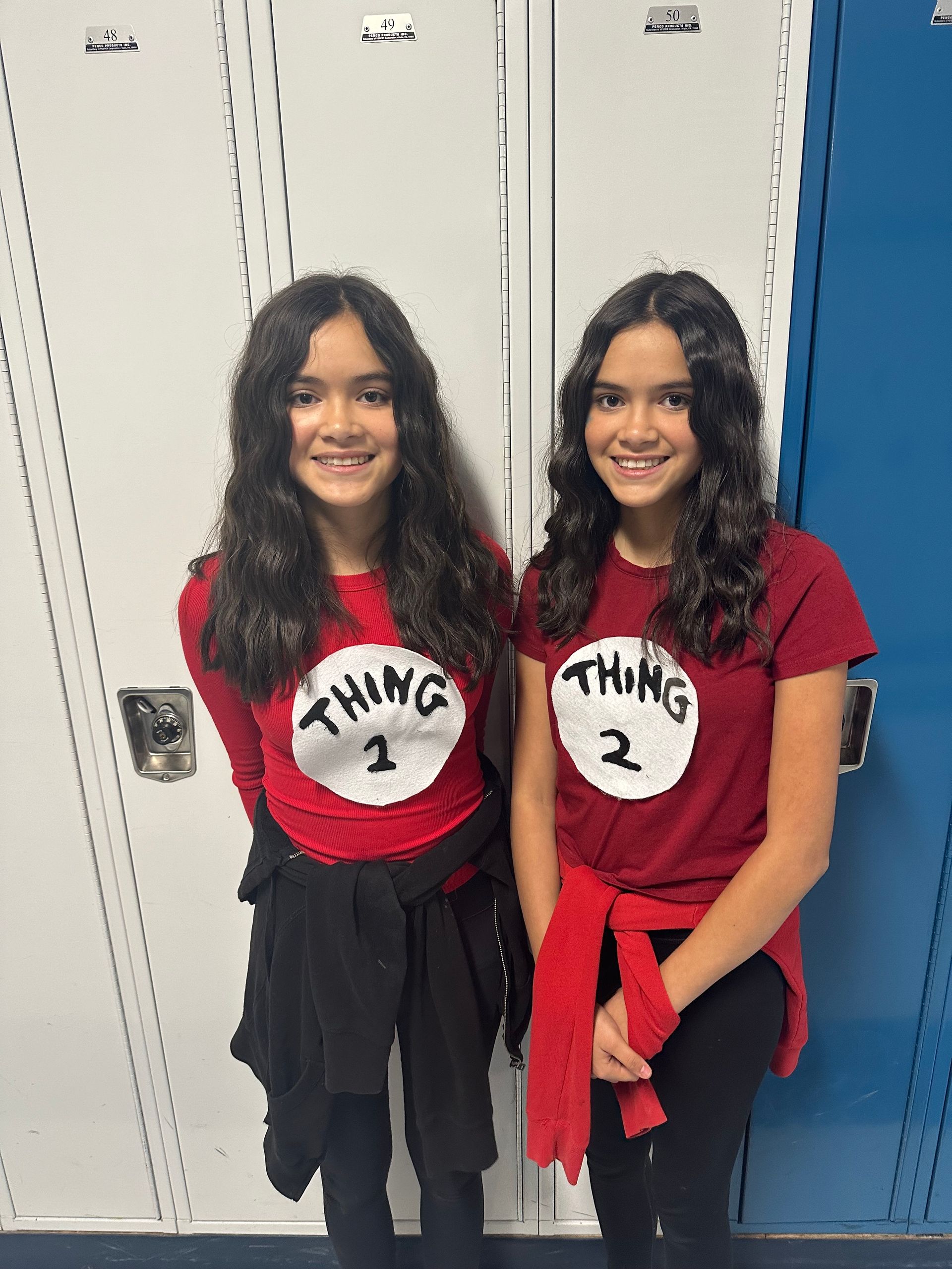 Two girls twinning as Thing 1 and Thing 2