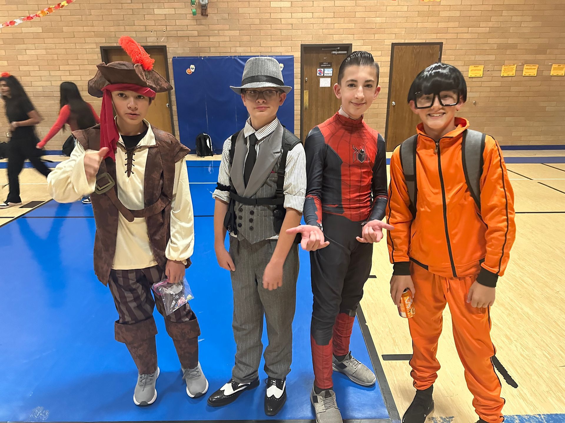 Four boys dressed for Halloween in PE