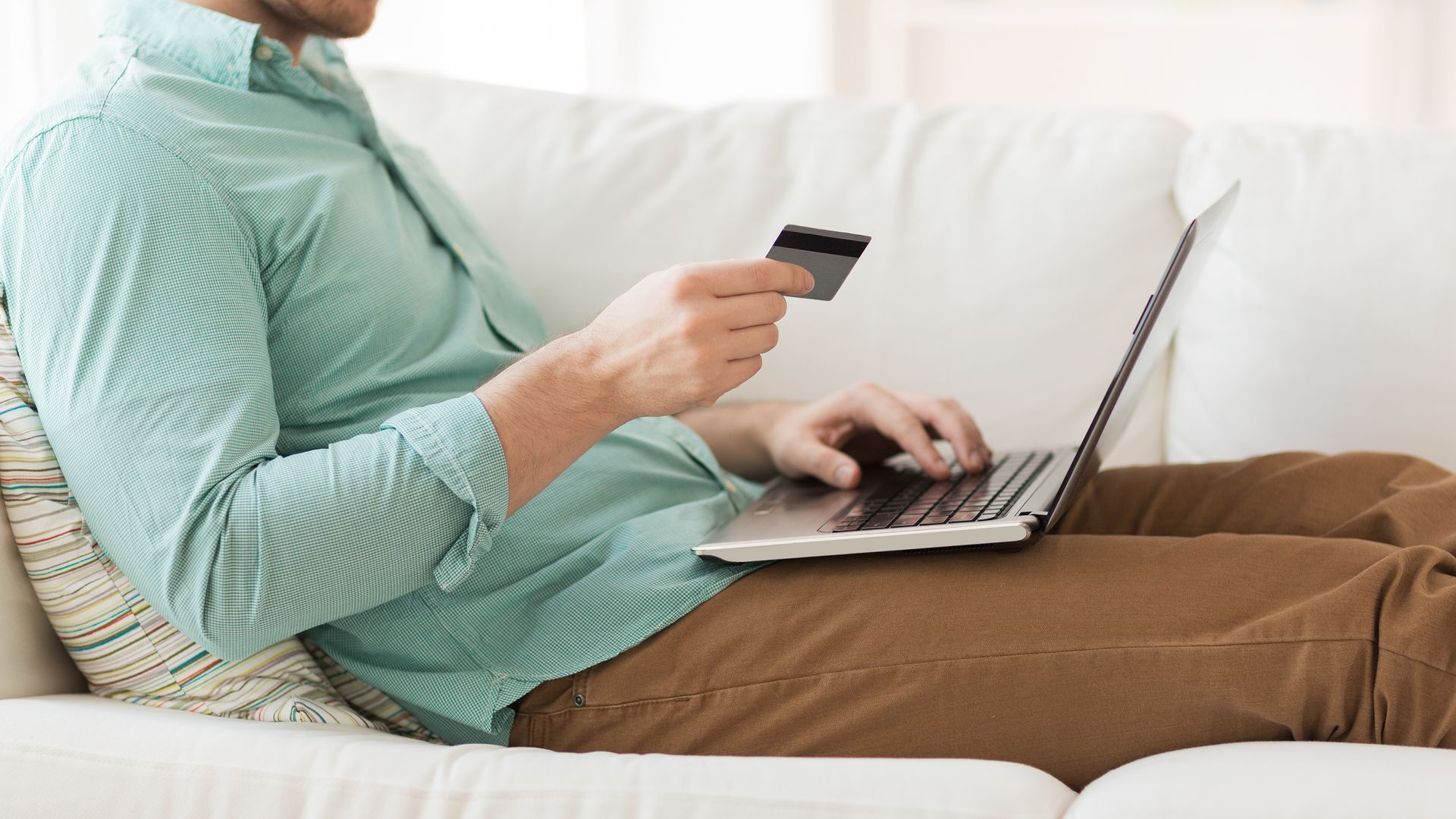 man paying rent online
