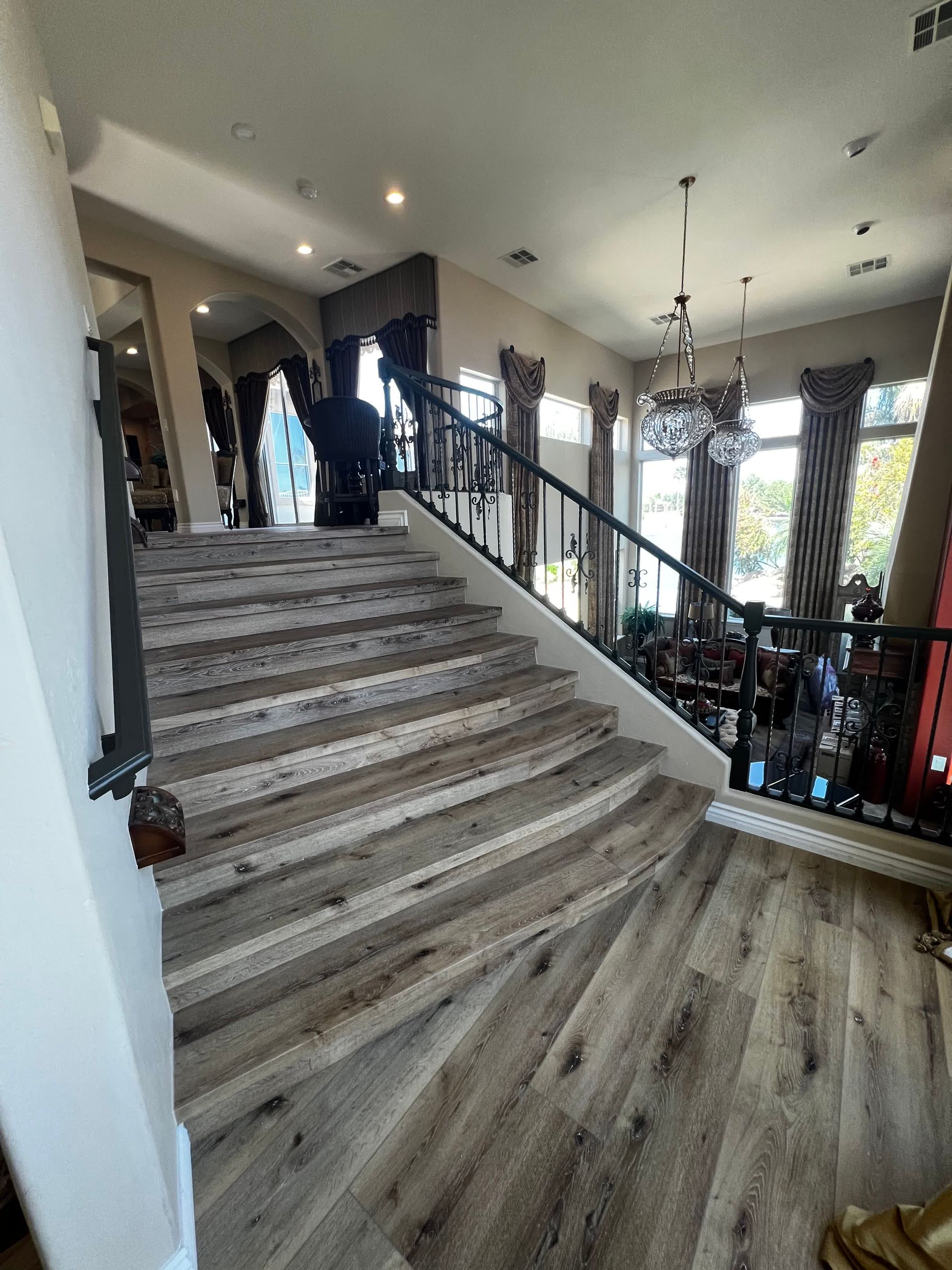 A set of stairs leading up to the second floor of a house.