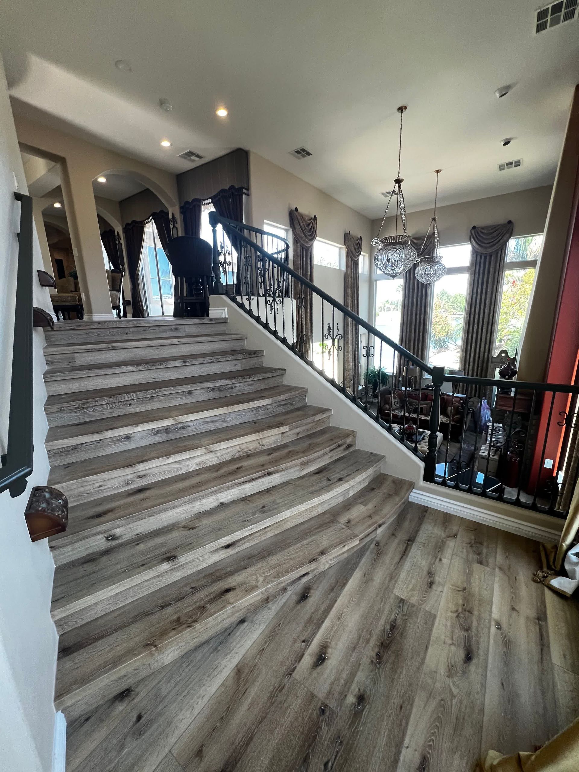 A set of stairs leading up to the second floor of a house
