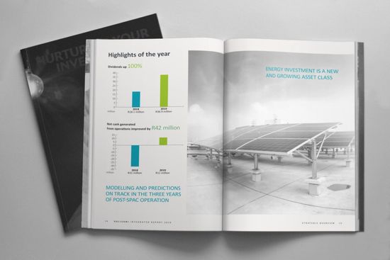 A book is open to a page with a picture of solar panels