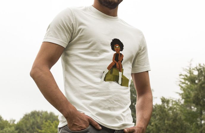 A man is wearing a white t-shirt with a picture of a woman on it.