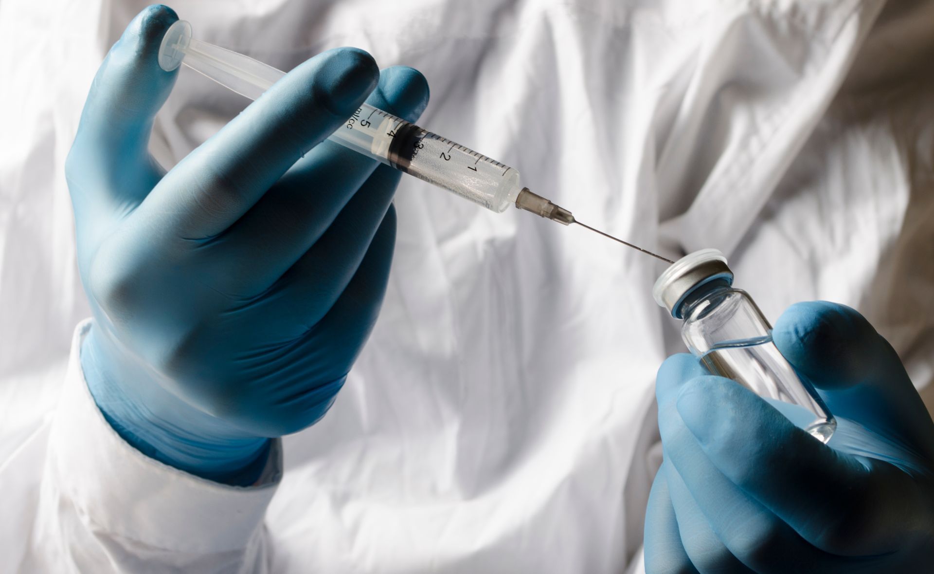 Placing Medication Within Syringe