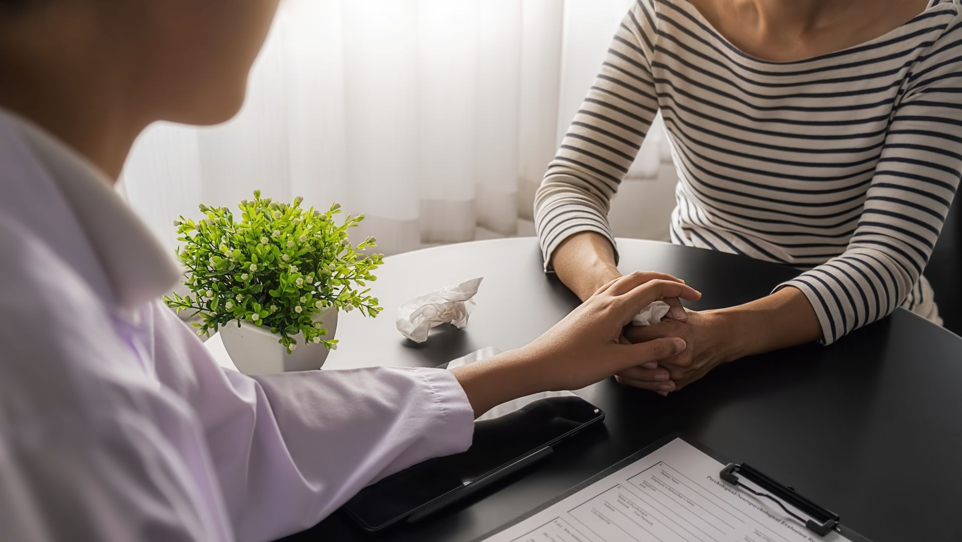 Chiropractor and Patient
