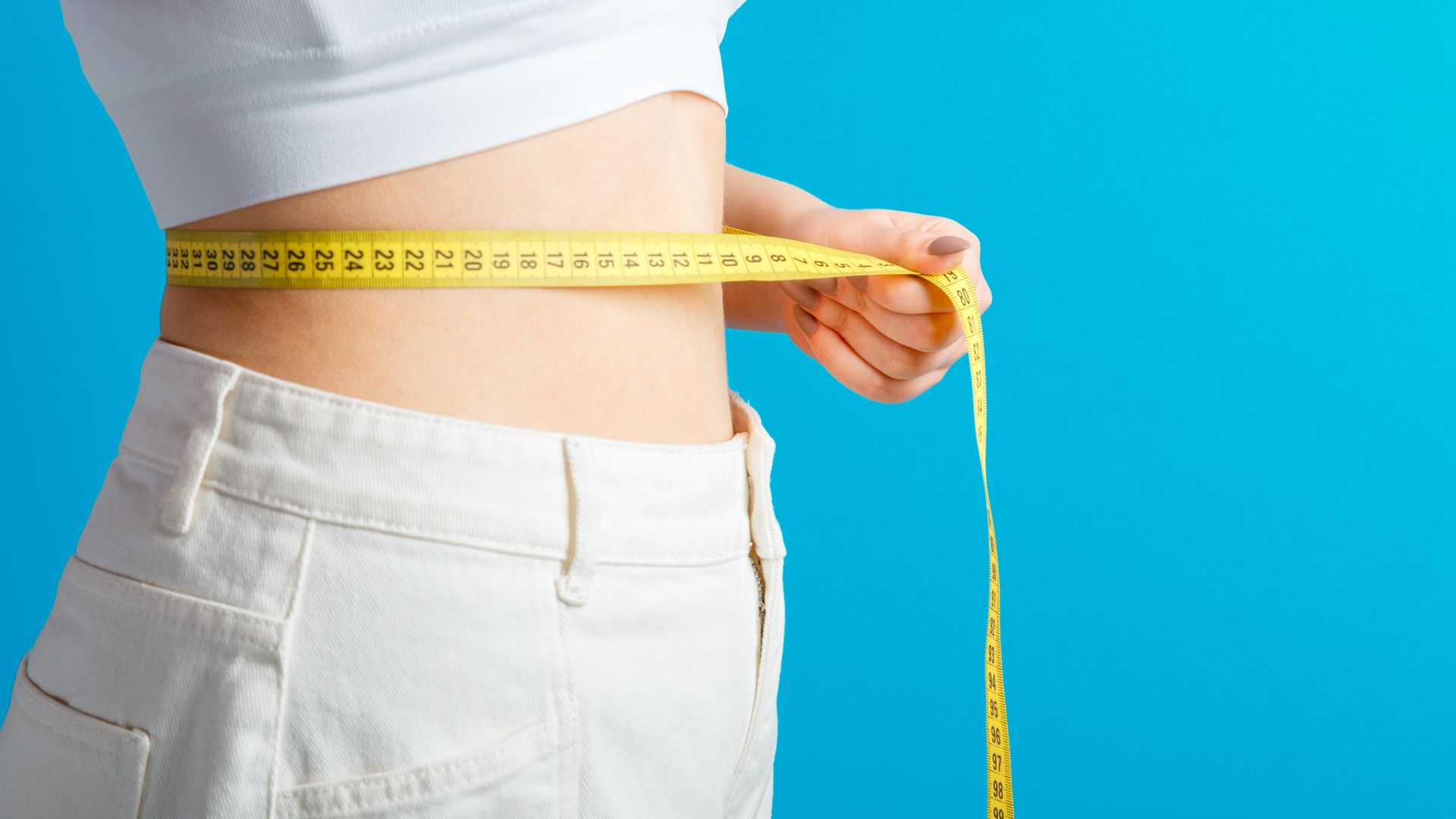 Woman Checking Her Waist Line