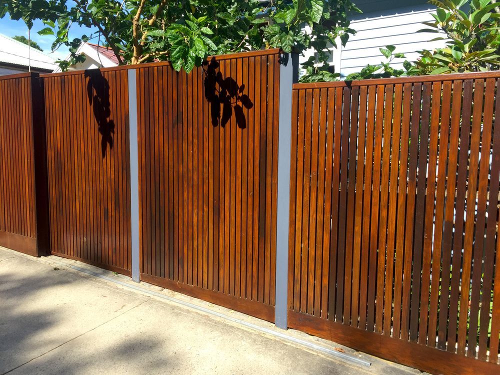 Wooden Slat Fence With Gray Posts — KLS Fencing In Normanton, QLD