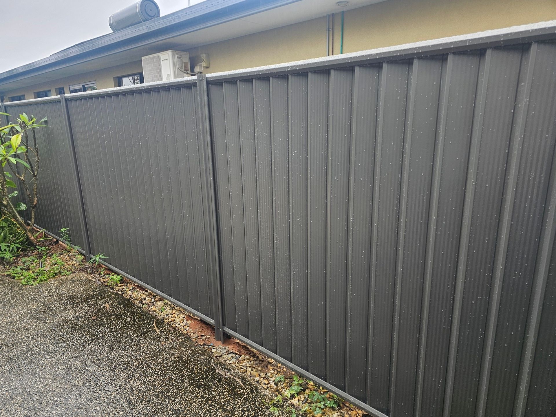 Dark Gray Corrugated Metal Fence — KLS Fencing In Edmonton, QLD