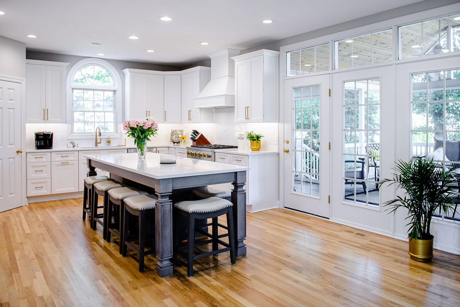 There is a large island in the middle of the kitchen.
