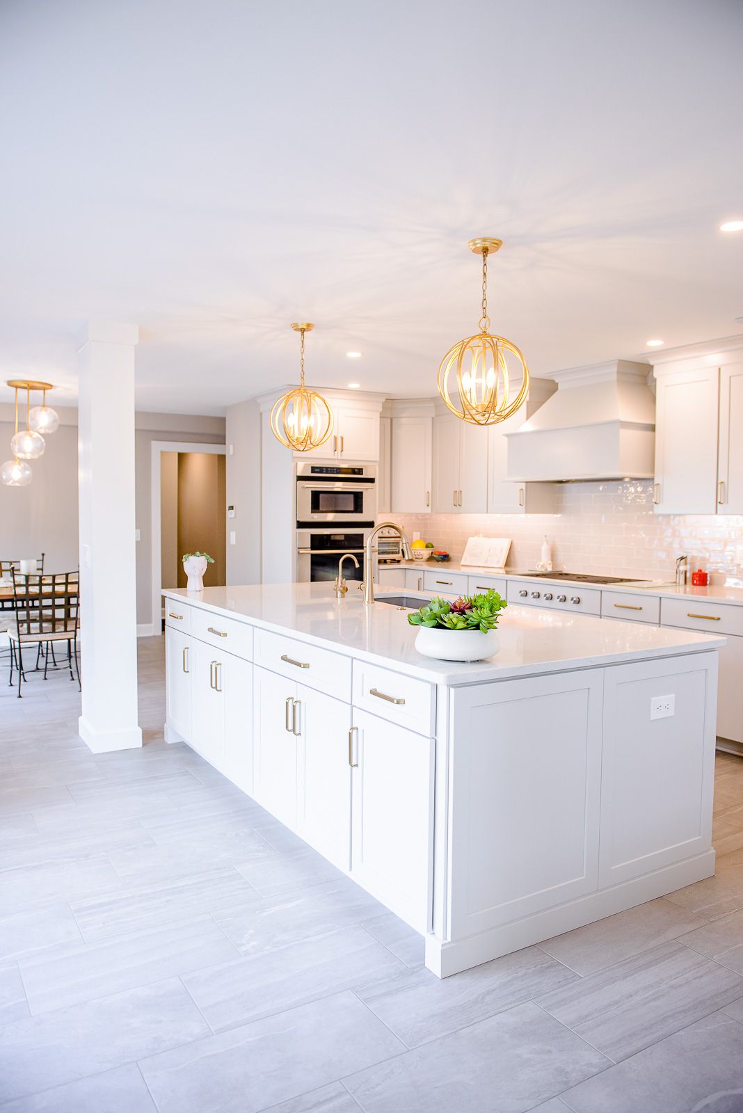 There is a large island in the middle of the kitchen.