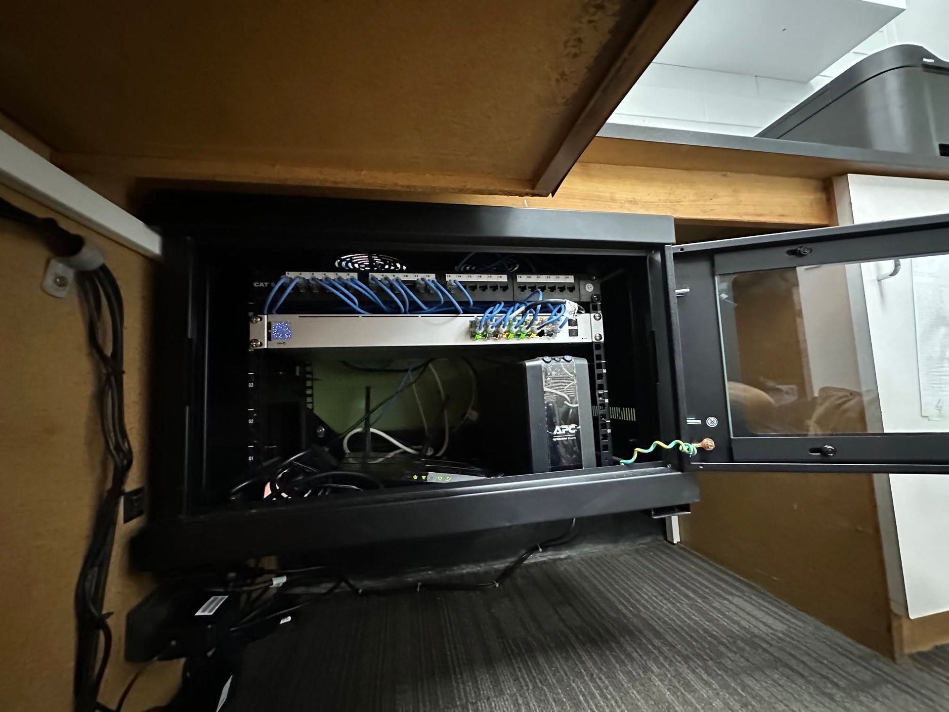 Open Computer Case Under a Desk, With Motherboard and Cables — LSEA Electrical Group in Bucasia, QLD