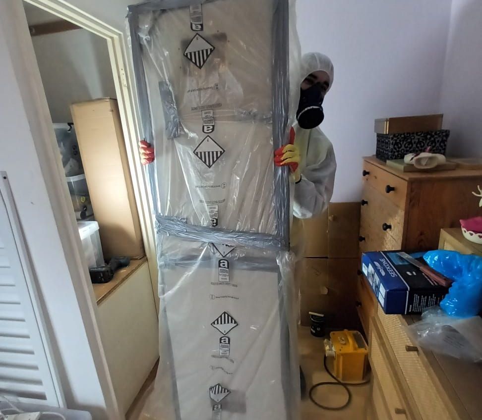 Safe removal of asbestos insulating board, labelled for disposal Domestic property, Buckstone, Edinburgh