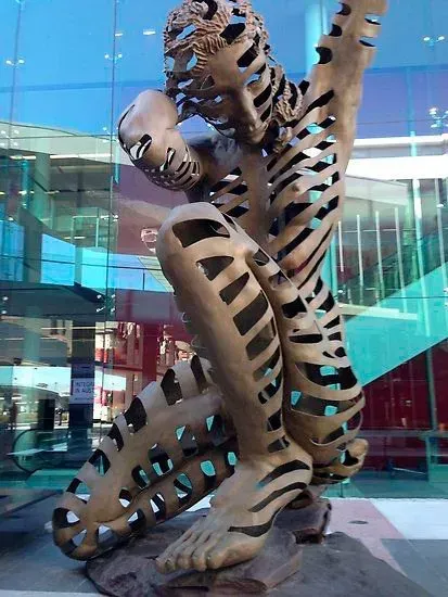 A statue of a man in a tiger costume
