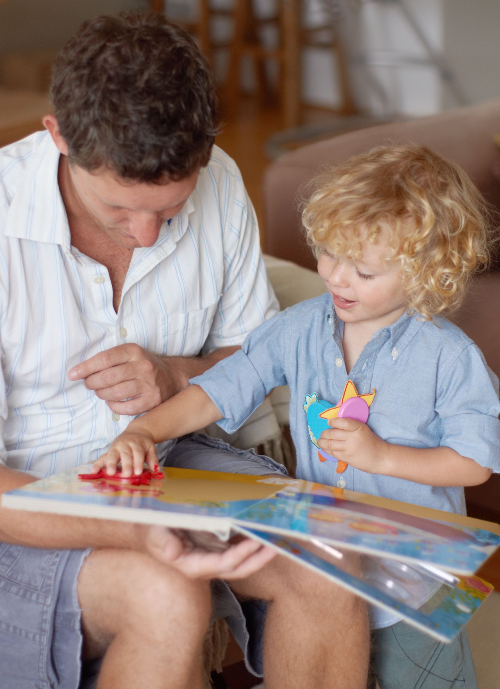 A woman and a little girl during an in home ABA therapy session