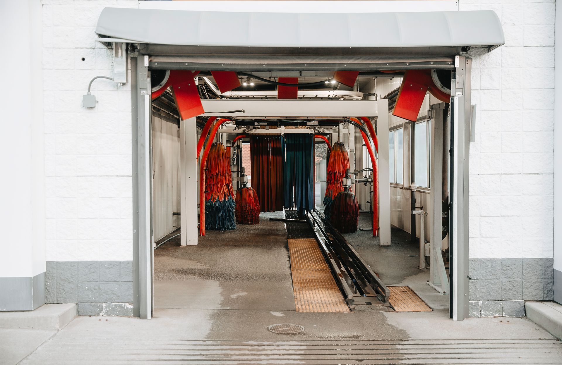 A Car Wash Inside Of A Building With The Door Open - San Pablo, CA - Grand Prix Car Wash San Pablo