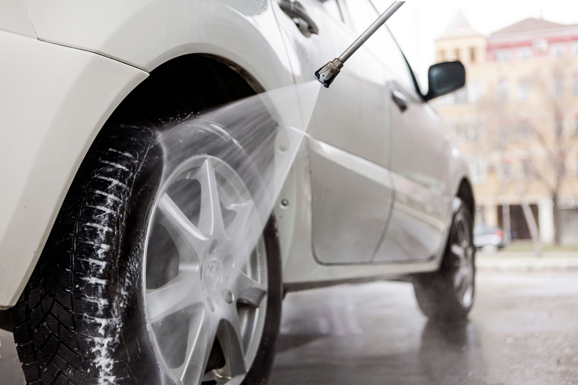 A Car Is Being Washed With A High Pressure Washer - San Pablo, CA - Grand Prix Car Wash San Pablo