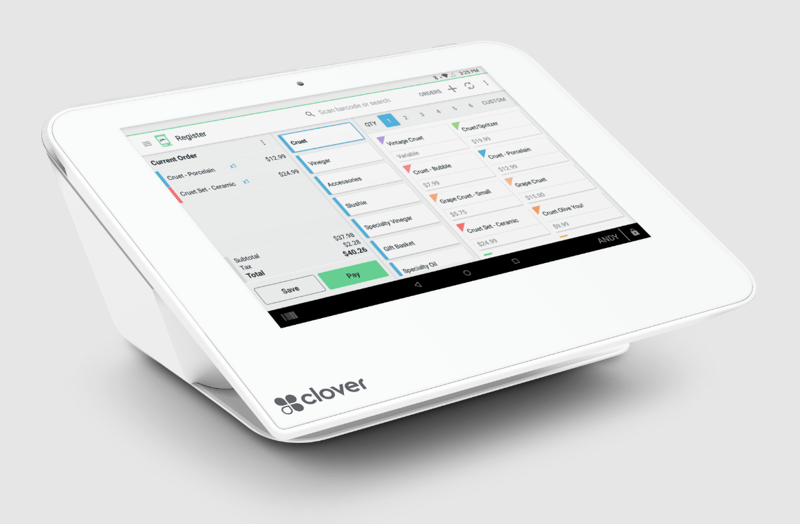A white tablet with a calendar on it is sitting on a table.