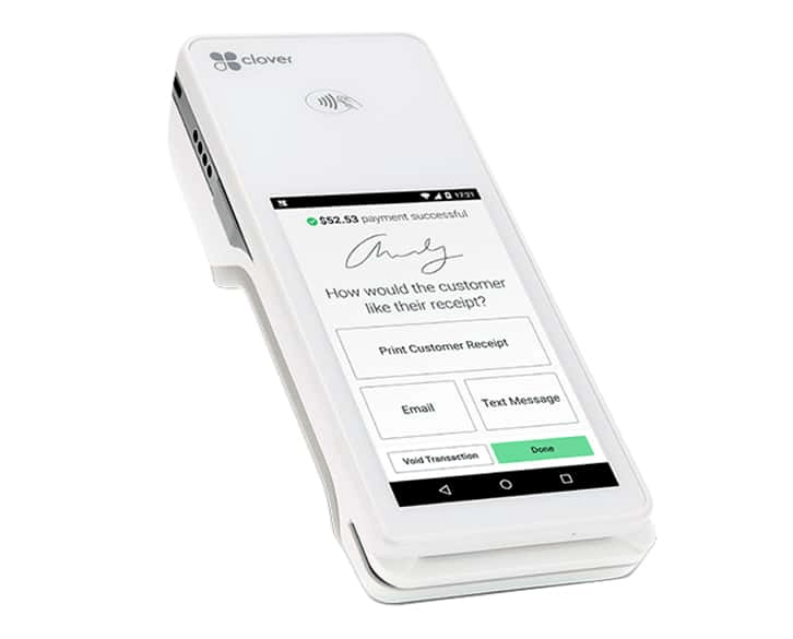 A white cell phone with a signature on the screen.