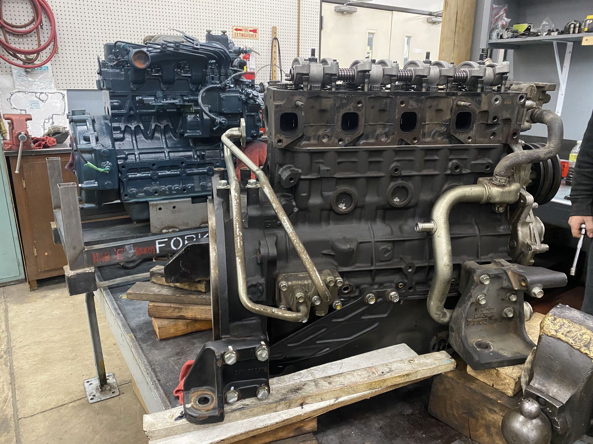 Professional Mechanic Testing Diesel Injector - Bellingham, WA - Northland Diesel Service