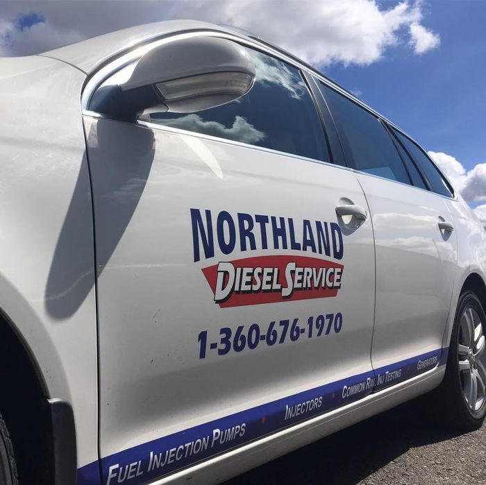 Car Mechanic Is Changing Engine Oil - Bellingham, WA - Northland Diesel Service