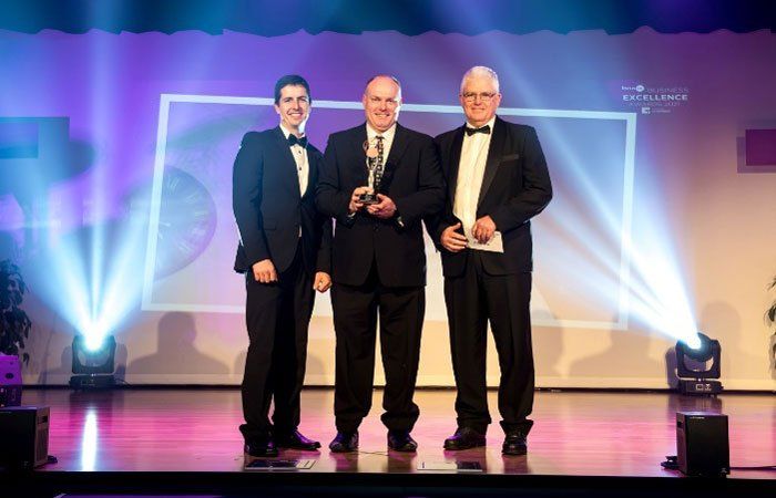 Stewart Eddie Accepting Business Award