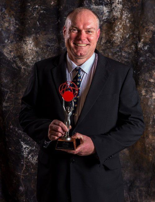 Stewart Eddie with Business Award