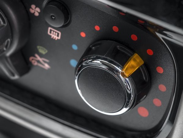 Close-up of a car climate control dial with red and blue temperature markings | Jeff's Automotive, Inc