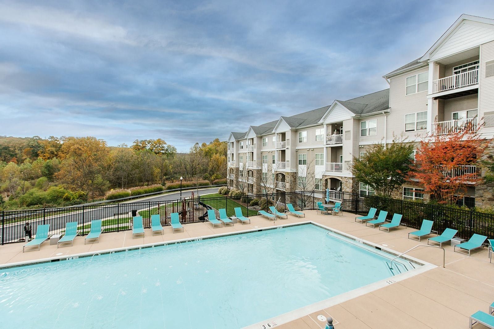 Outdoor swimming pool at The Villas at Mill Run Apartments in Owings Mills, MD.
