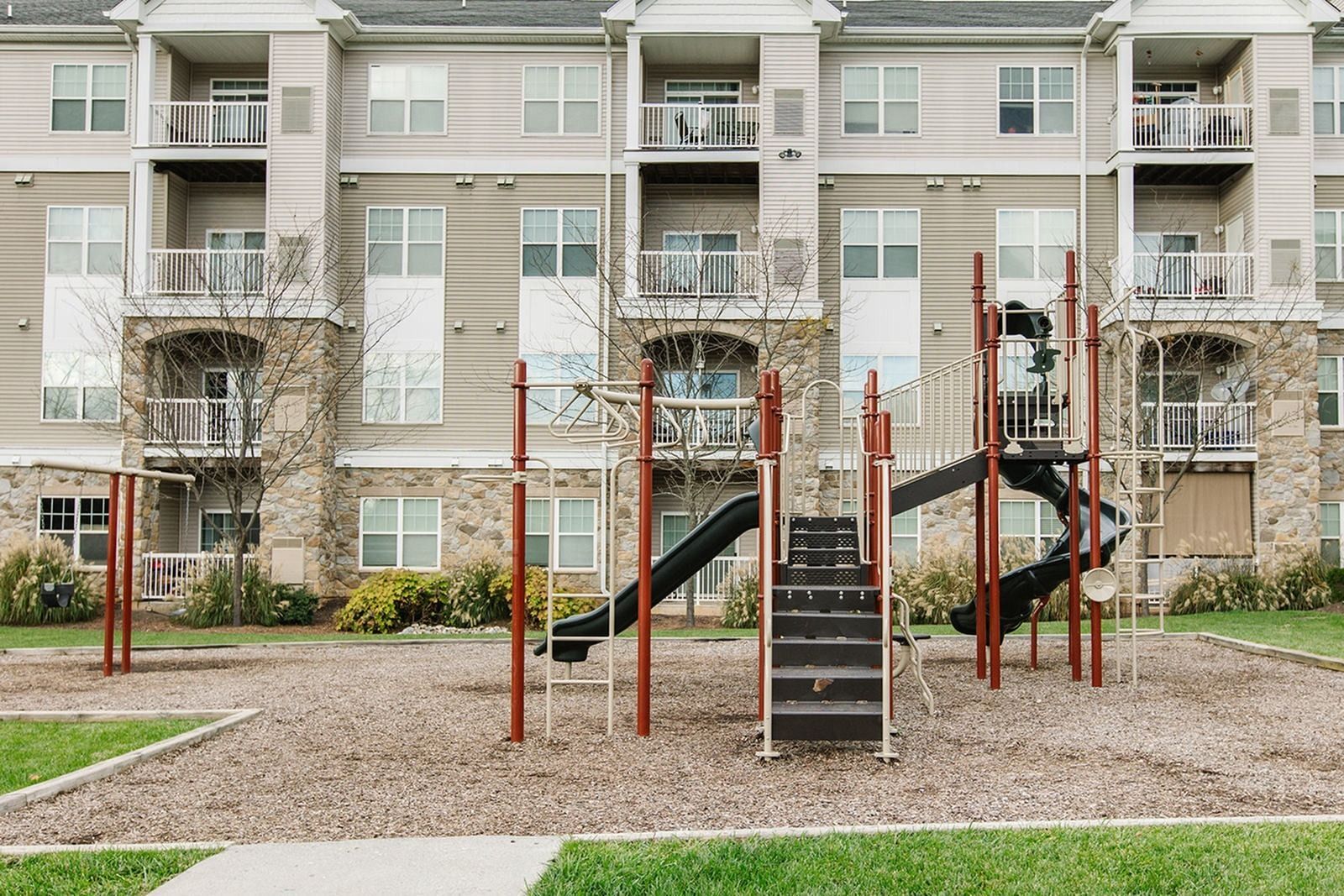 Outdoor playground beside the apartment community at The Villas at Mill Run Apartments in Owings Mills, MD.