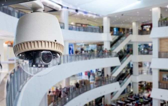 White Tapo security camera mounted on a 3D printer frame.