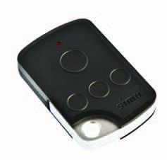 Black remote control with four round buttons and a small red indicator light