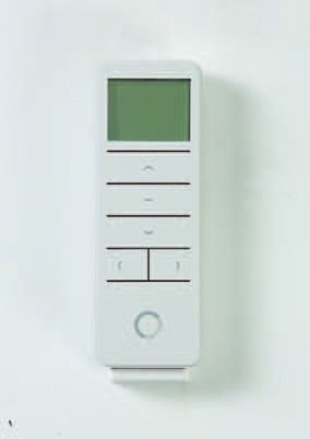 Wall-mounted white thermostat with blank green display and button controls