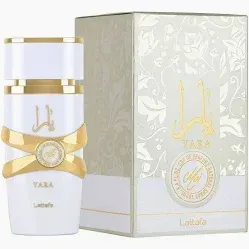 Frasco de perfume blanco con detalles dorados y caja con diseño floral.