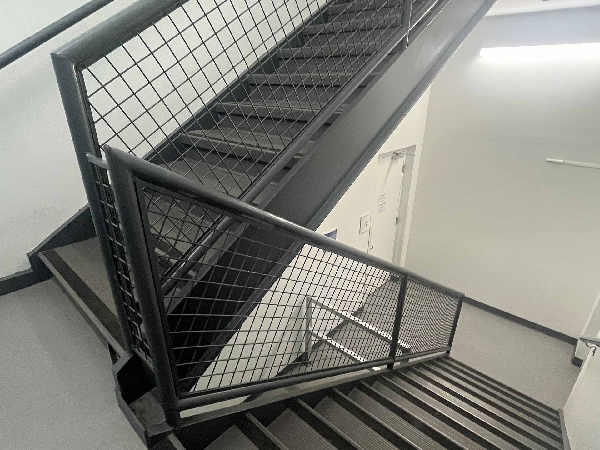 custom infill used in railing for egress stairs