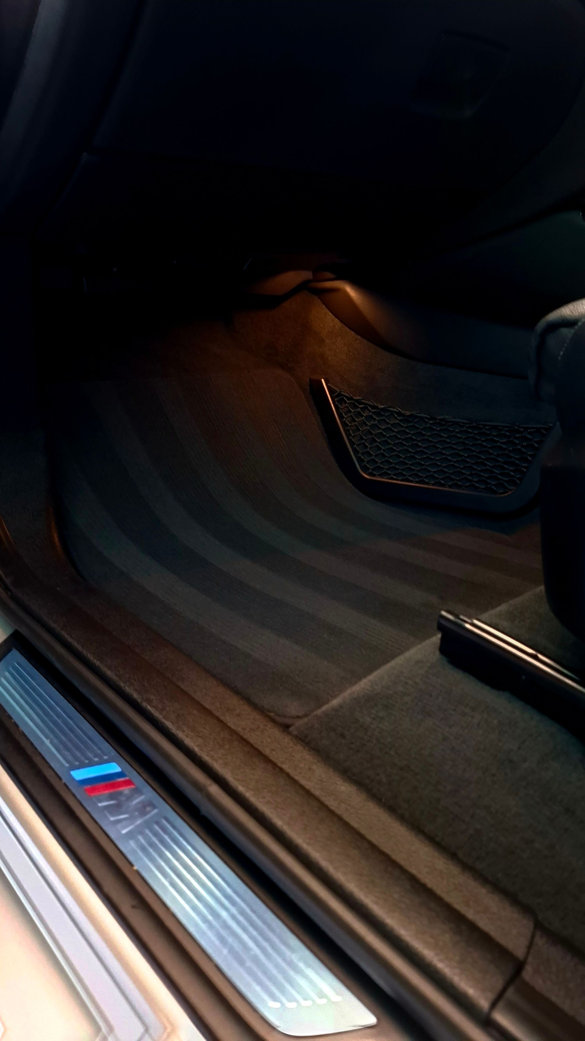 A close up of a car door with a bmw logo on it — Ocean Glow Car Detailing in Long Jetty NSW